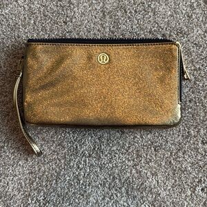 lululemon athletica Shimmering Gold Wristlet
